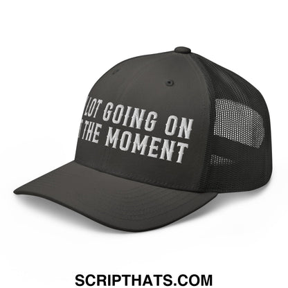 Black mesh trucker hat with white embroidered text not going on the moment front for casual wear