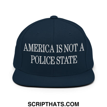 Navy blue snapback hat with white embroidered america is not a police state text and flat bill brim design