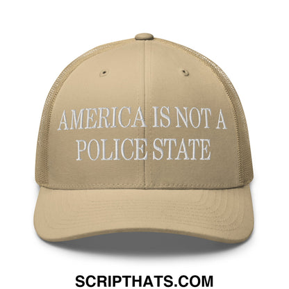 Beige mesh trucker hat with white embroidered text america is not a police state across the front panel