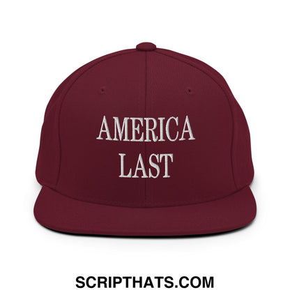 Maroon flat bill brim snapback hat with white embroidered america last text in a casual streetwear style