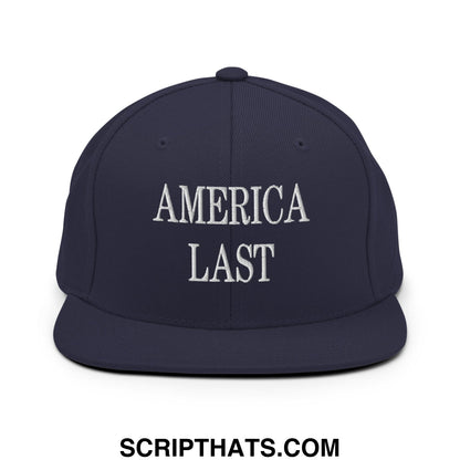 Navy blue snapback hat with flat bill brim and white embroidered america last text for casual wear
