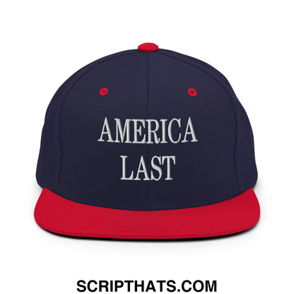 Navy blue and red snapback hat with flat bill and white embroidered america last text in front