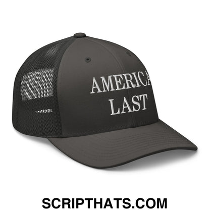 Black mesh trucker hat with white embroidered america last text on the front ideal for casual wear