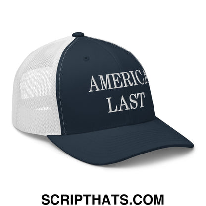 Navy blue and white mesh trucker hat with america last embroidered in silver thread on front panel