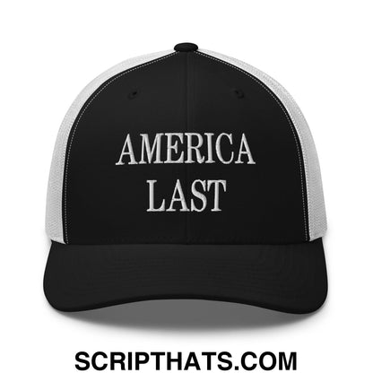 Black and white mesh trucker hat with america last embroidered in silver thread on the front panel