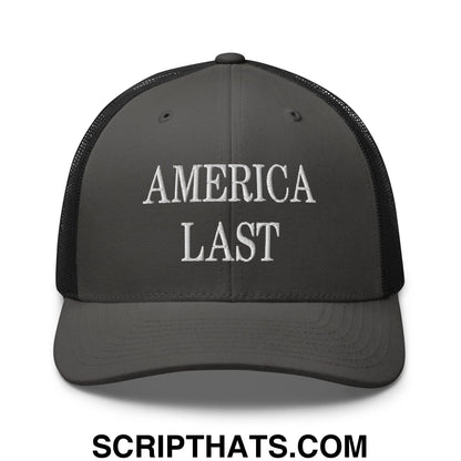 Dark gray mesh trucker hat with white embroidered america last text on the front panel