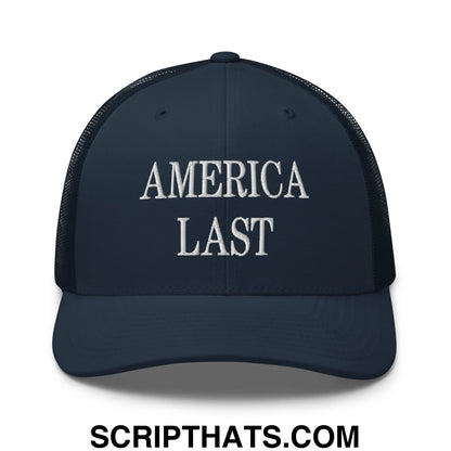 Dark navy blue mesh trucker hat with white embroidered america last text on the front