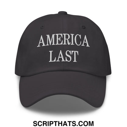 Black unstructured dad hat with america last embroidered in white thread on the front panel