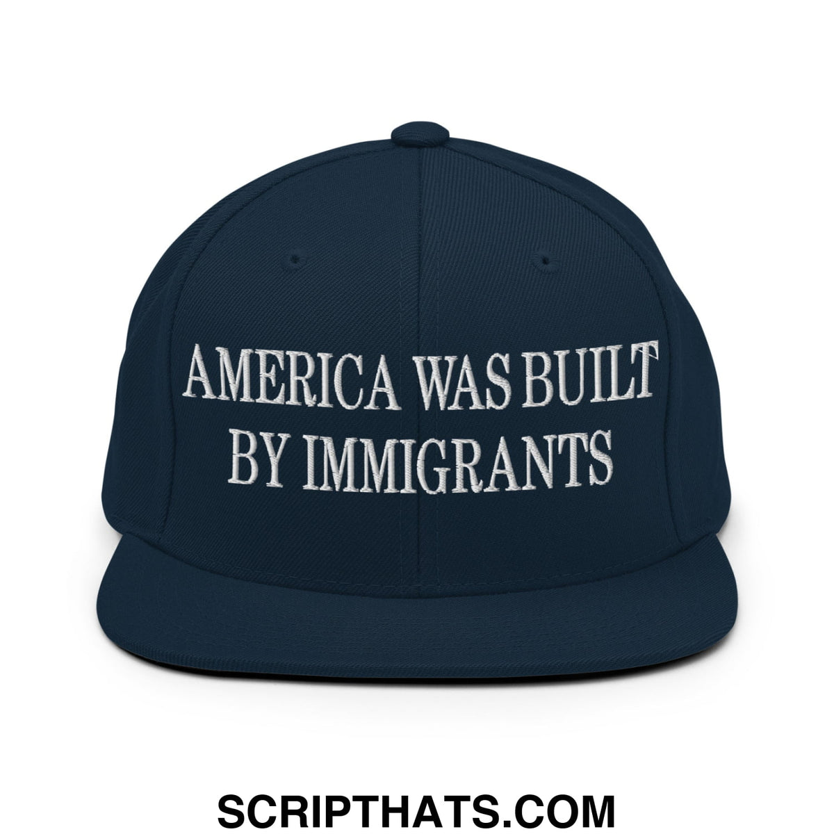 Navy blue snapback hat with white embroidered america was built by immigrants text and flat bill brim design
