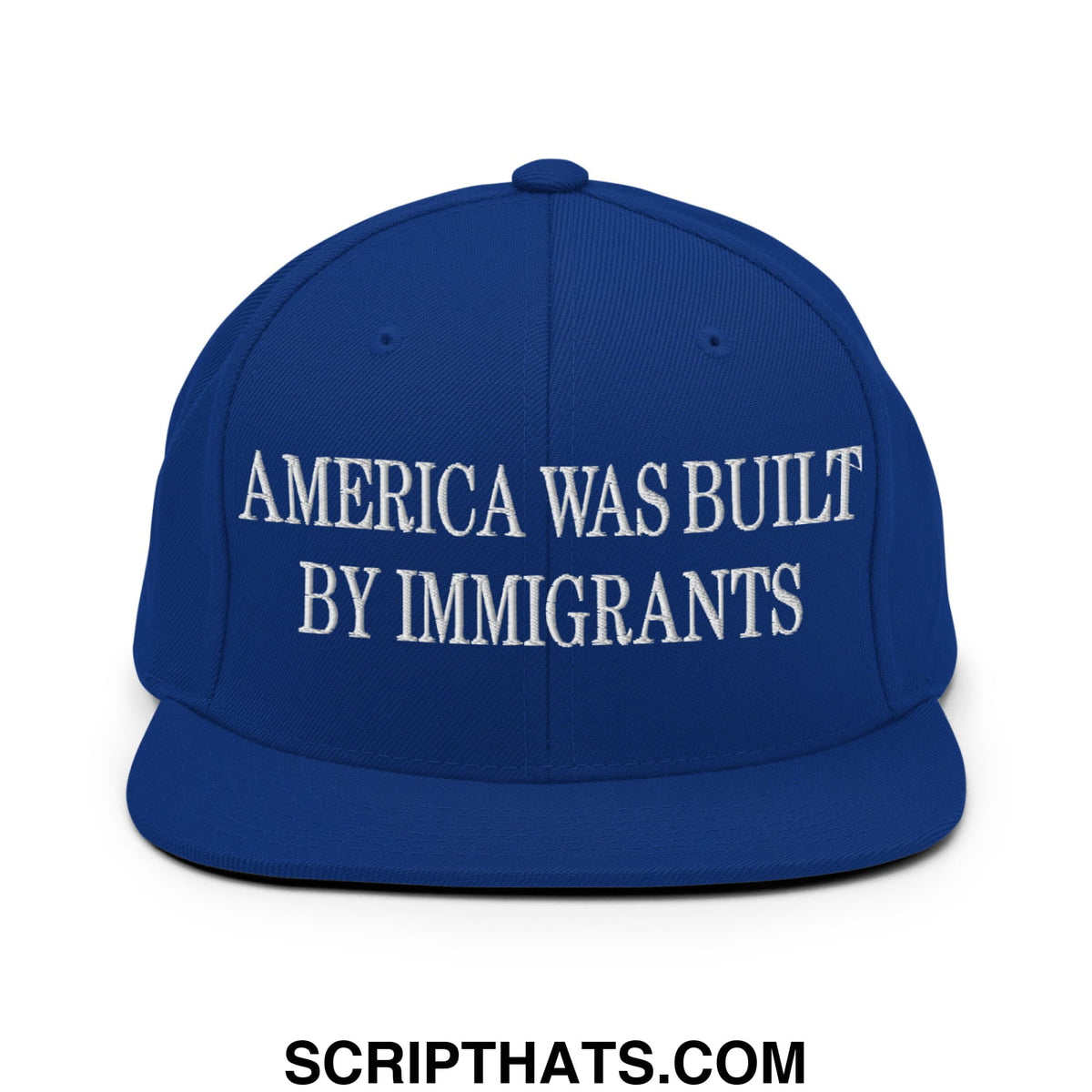 Royal blue snapback hat with white embroidered america was built by immigrants text and flat bill brim design