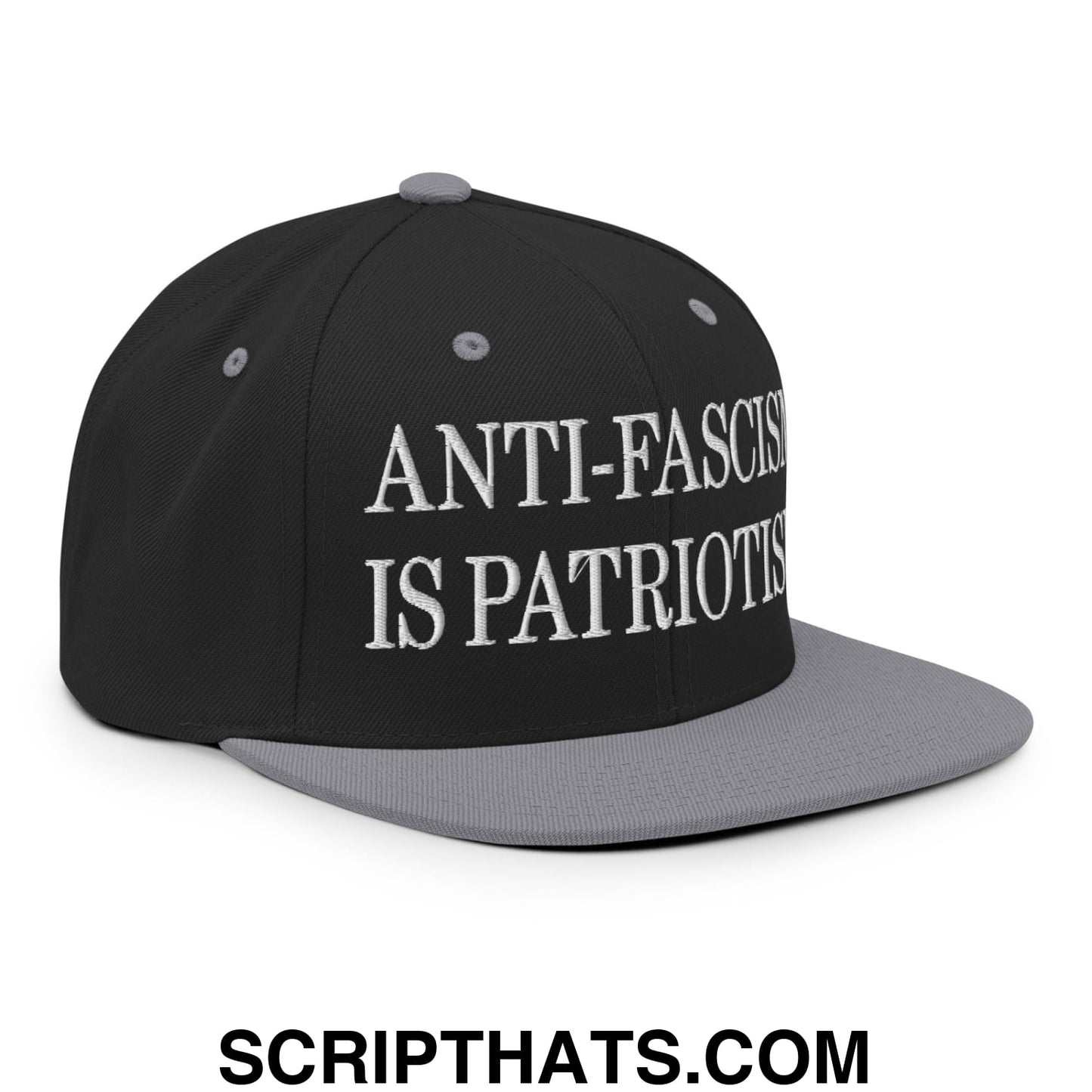 Black and gray snapback cap with white embroidered anti-fascism is patriotism text and flat bill brim