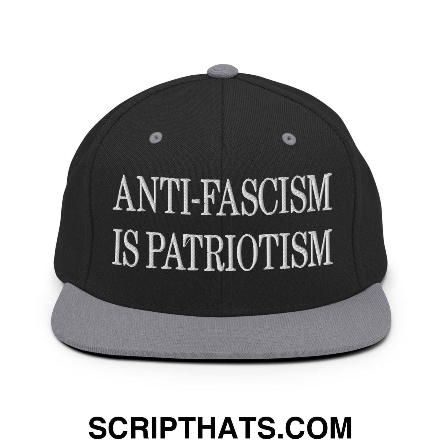 Black snapback cap with gray brim and white embroidered anti-fascism is patriotism text flat bill brim design