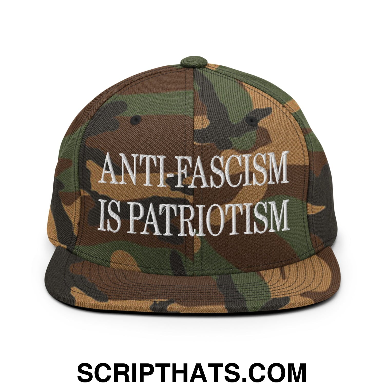 A camouflage snapback hat with white embroidered text anti fascism is patriotism and a flat bill brim