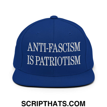 Royal blue flat bill snapback hat with white embroidered anti-fascism is patriotism text for casual wear