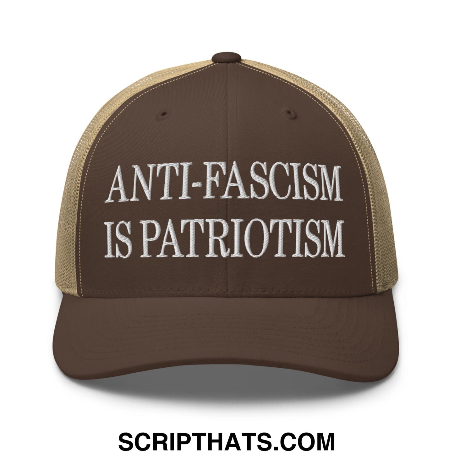 Brown and tan mesh trucker hat with white embroidered text anti fascism is patriotism on front panel