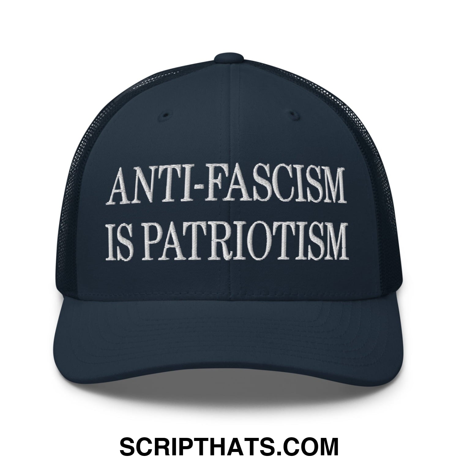 Dark navy blue mesh trucker hat with white embroidered anti-fascism is patriotism text on front panel