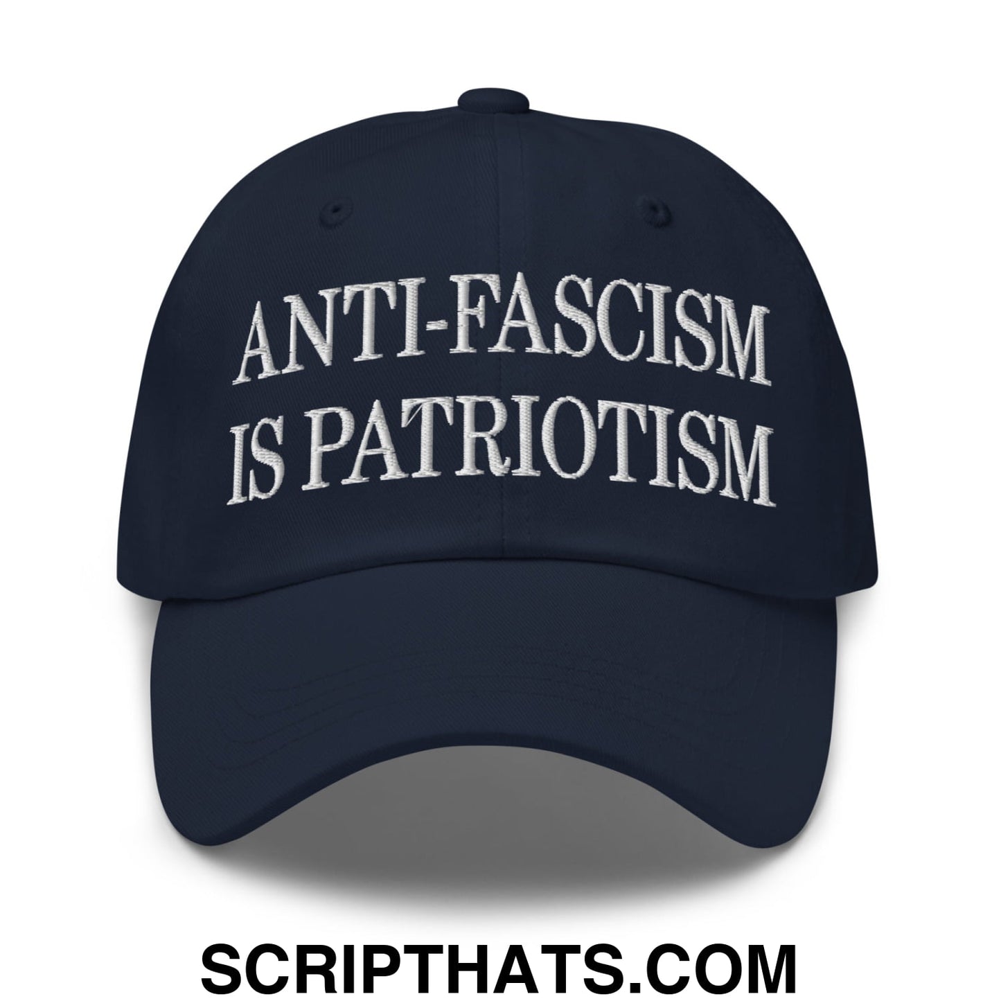 Navy blue unstructured dad hat with white embroidered text anti-fascism is patriotism, casual streetwear style