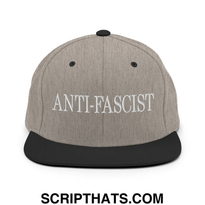 Gray and black snapback hat with white embroidered anti-fascist text and flat bill brim design