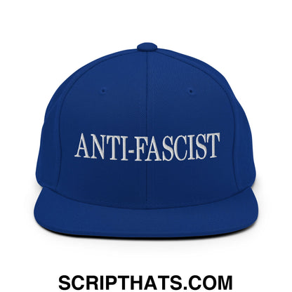 Royal blue snapback hat with white embroidered anti-fascist text and flat bill brim for casual wear