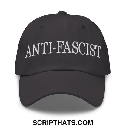Black unstructured dad hat with white embroidered anti-fascist text on front suitable for casual wear