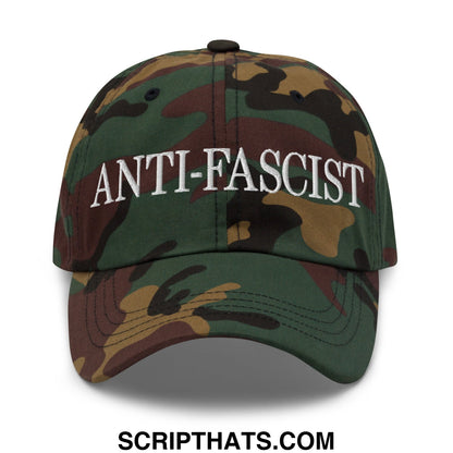 A camouflage-patterned unstructured dad hat with anti-fascist embroidered in white on the front