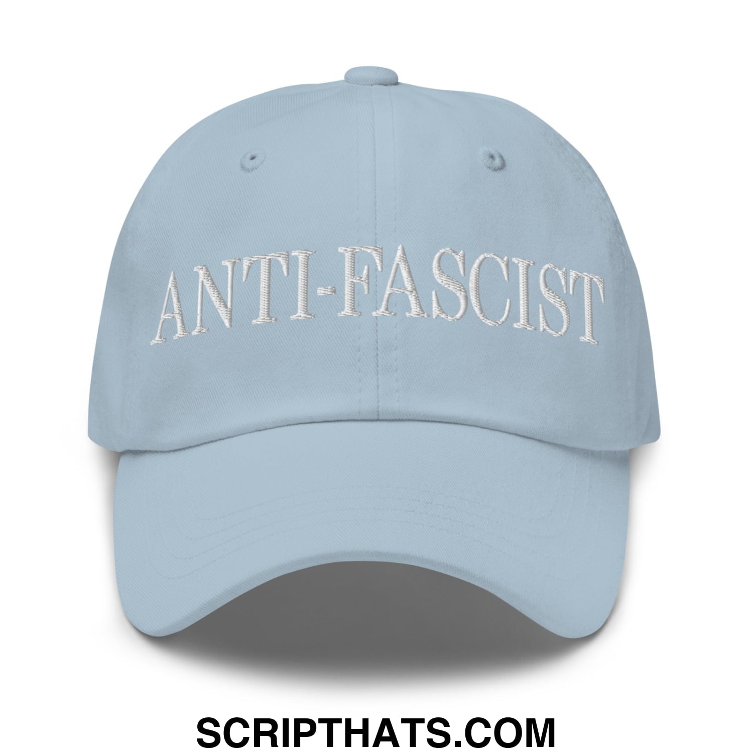 Light blue unstructured dad hat with white embroidered anti-fascist text on front for casual wear