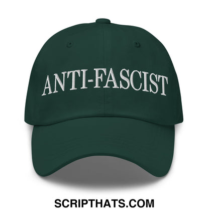Dark green unstructured dad hat with white embroidered anti-fascist text across the front panel