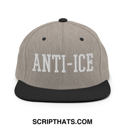 Gray and black snapback hat with anti-ice embroidered in white on flat bill brim for casual wear