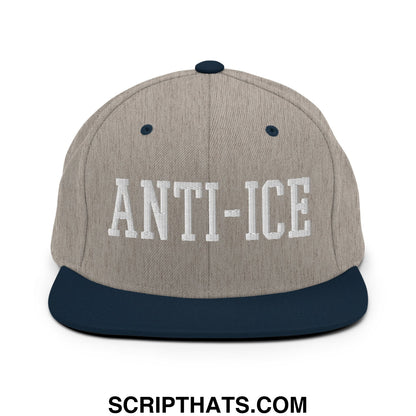 Gray and navy blue snapback hat with anti-ice embroidered in white on the flat bill brim design