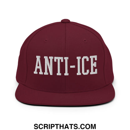 Maroon flat bill brim snapback hat with white embroidered anti ice lettering and adjustable back closure