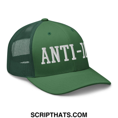 Dark green mesh trucker hat with white embroidered anti- lettering across the front designed for casual wear