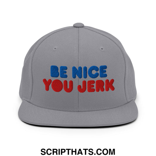 Gray snapback hat with embroidered blue and red text reading be nice you jerk and a flat bill brim