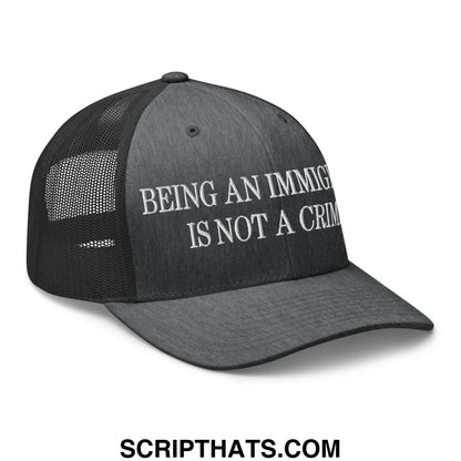 Being an Immigrant is not a Crime Embroidered Mesh Trucker Hat Dark Heather Gray