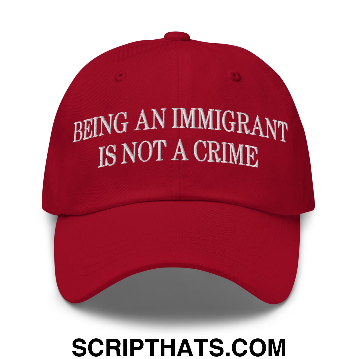 Being an Immigrant is not a Crime Embroidered Unstructured Dad Hat Cranberry