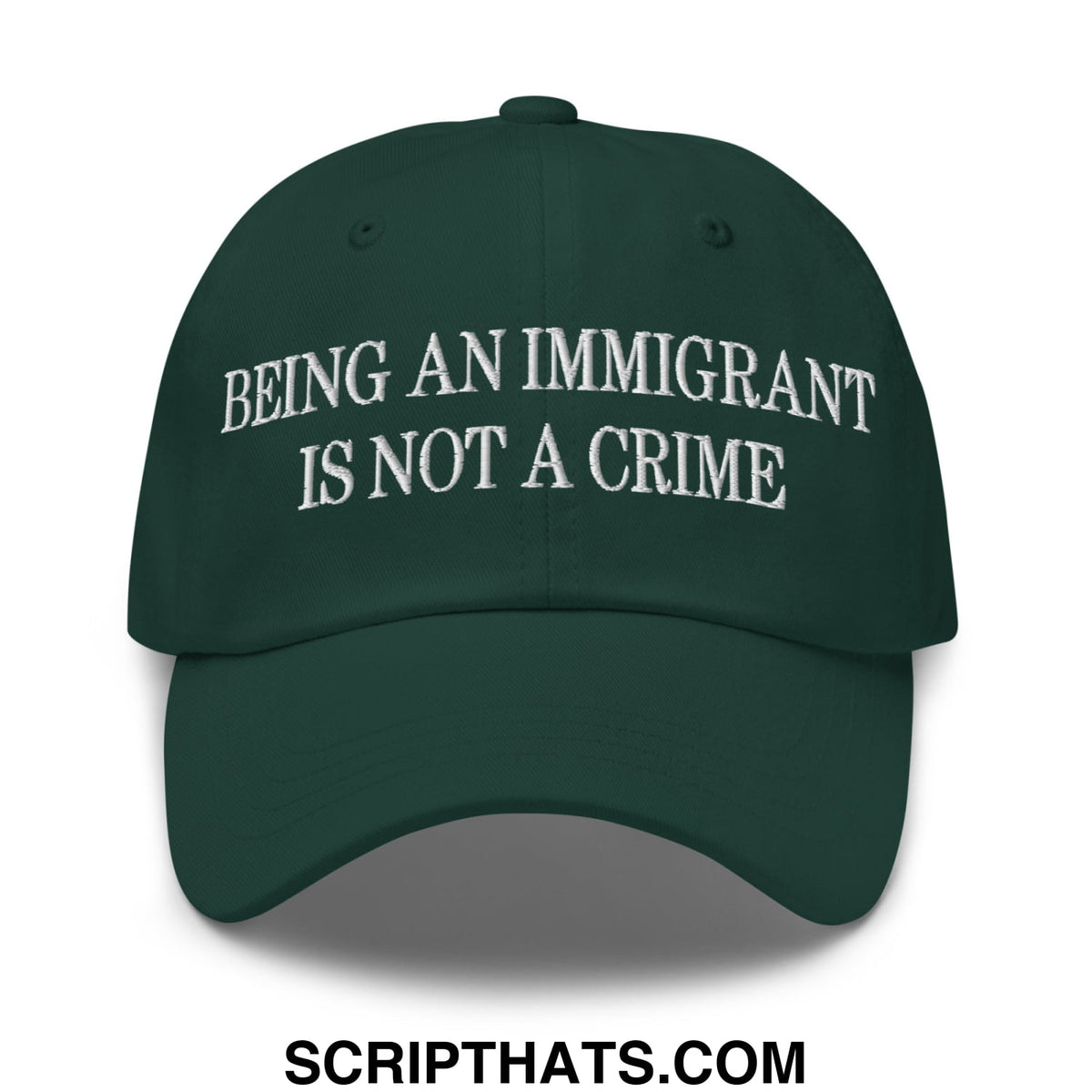 Dark green unstructured dad hat with white embroidered text being an immigrant is not a crime for casual wear