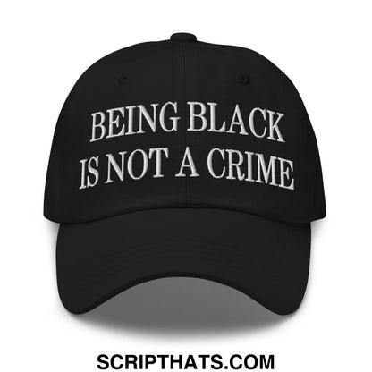 Black embroidered unstructured dad hat with white text being black is not a crime on the front panel