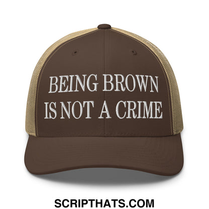 Brown and tan mesh trucker hat with white embroidered text being brown is not a crime on front panel