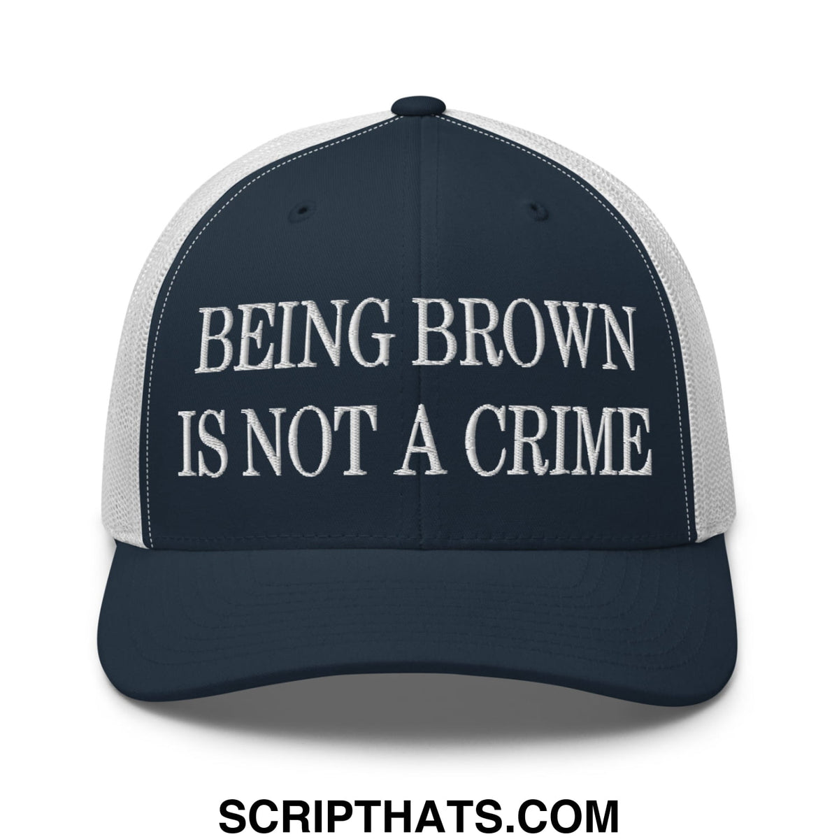 Navy blue and white mesh trucker hat with embroidered being brown is not a crime text on front panel