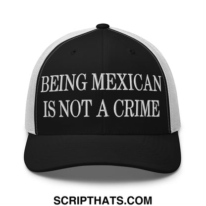Black and white mesh trucker hat embroidered with being mexican is not a crime in bold uppercase letters