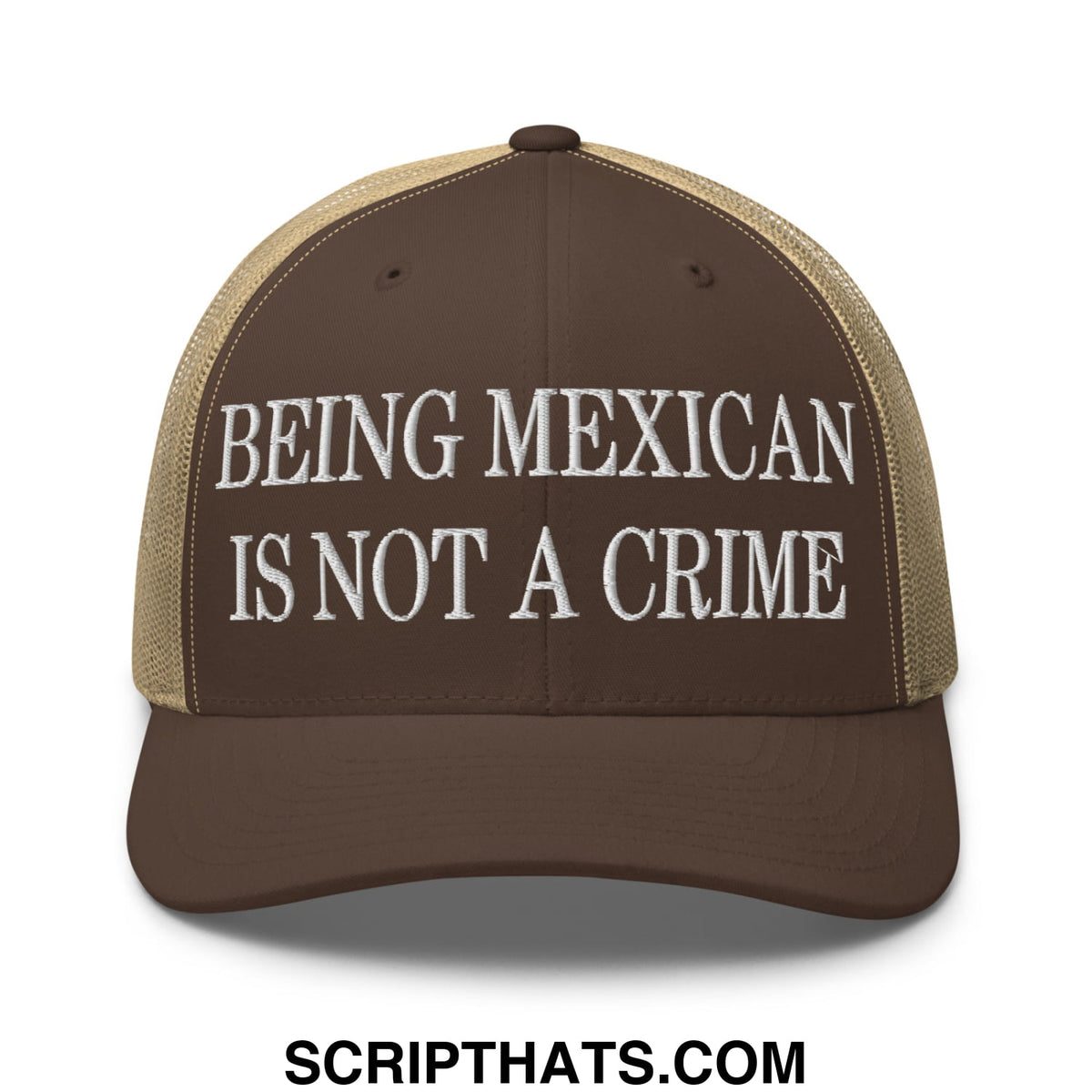 Brown and tan mesh trucker hat with white embroidered text being mexican is not a crime