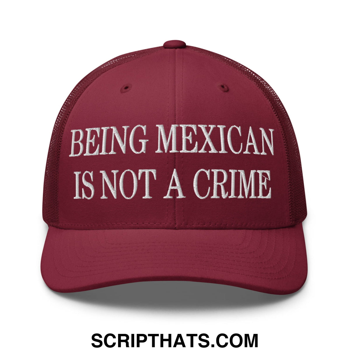 Maroon mesh trucker hat embroidered with white text being mexican is not a crime on the front panel
