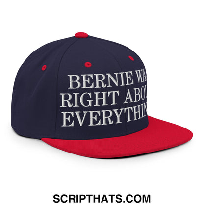 Navy blue and red snapback cap with white embroidered text reading bernie was right about everything on front brim
