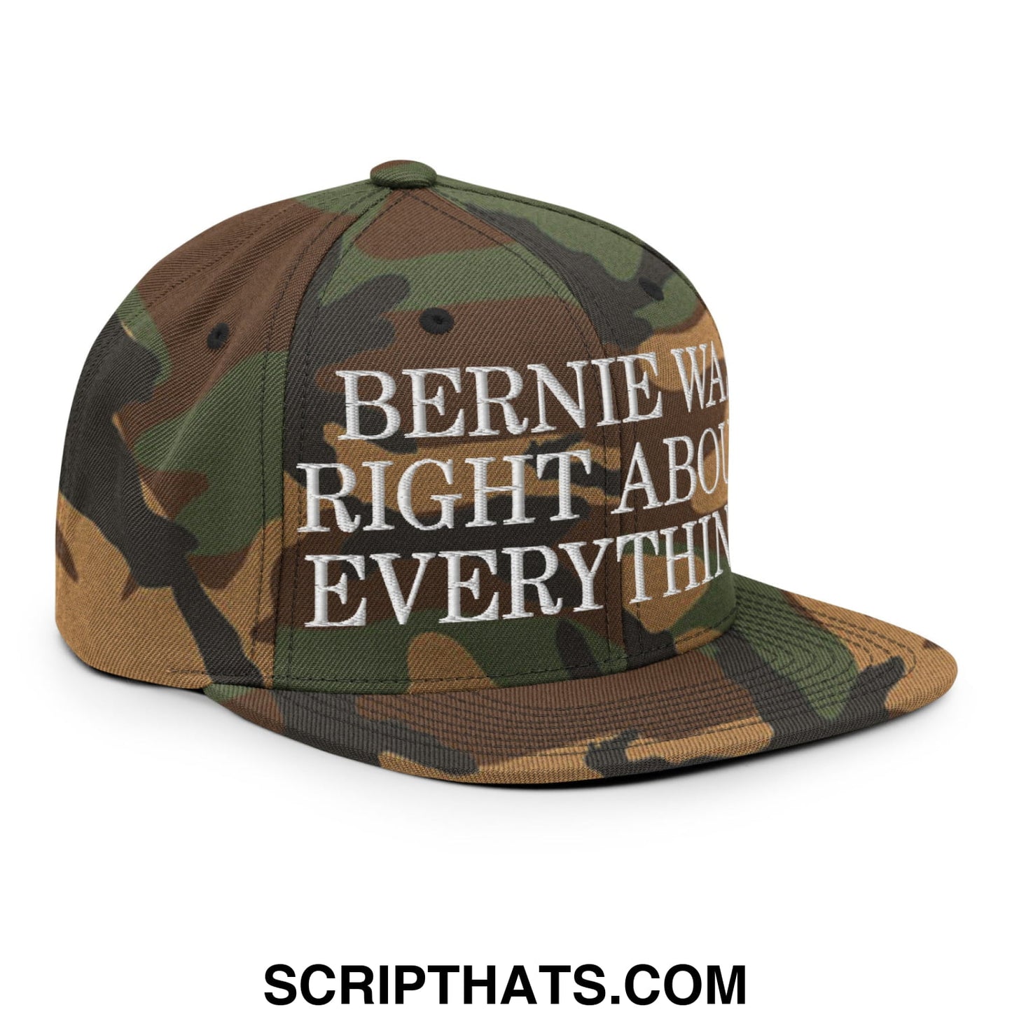 Camouflage-patterned snapback hat with white embroidered text bernie was right about everything and flat bill brim