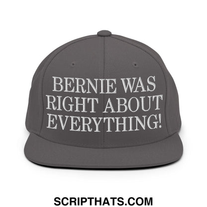 A dark gray snapback hat with white embroidered text reading bernie was right about everything flat bill brim