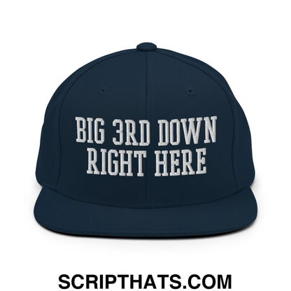 Navy blue snapback cap with white embroidered big 3rd down right here text and a flat bill brim design