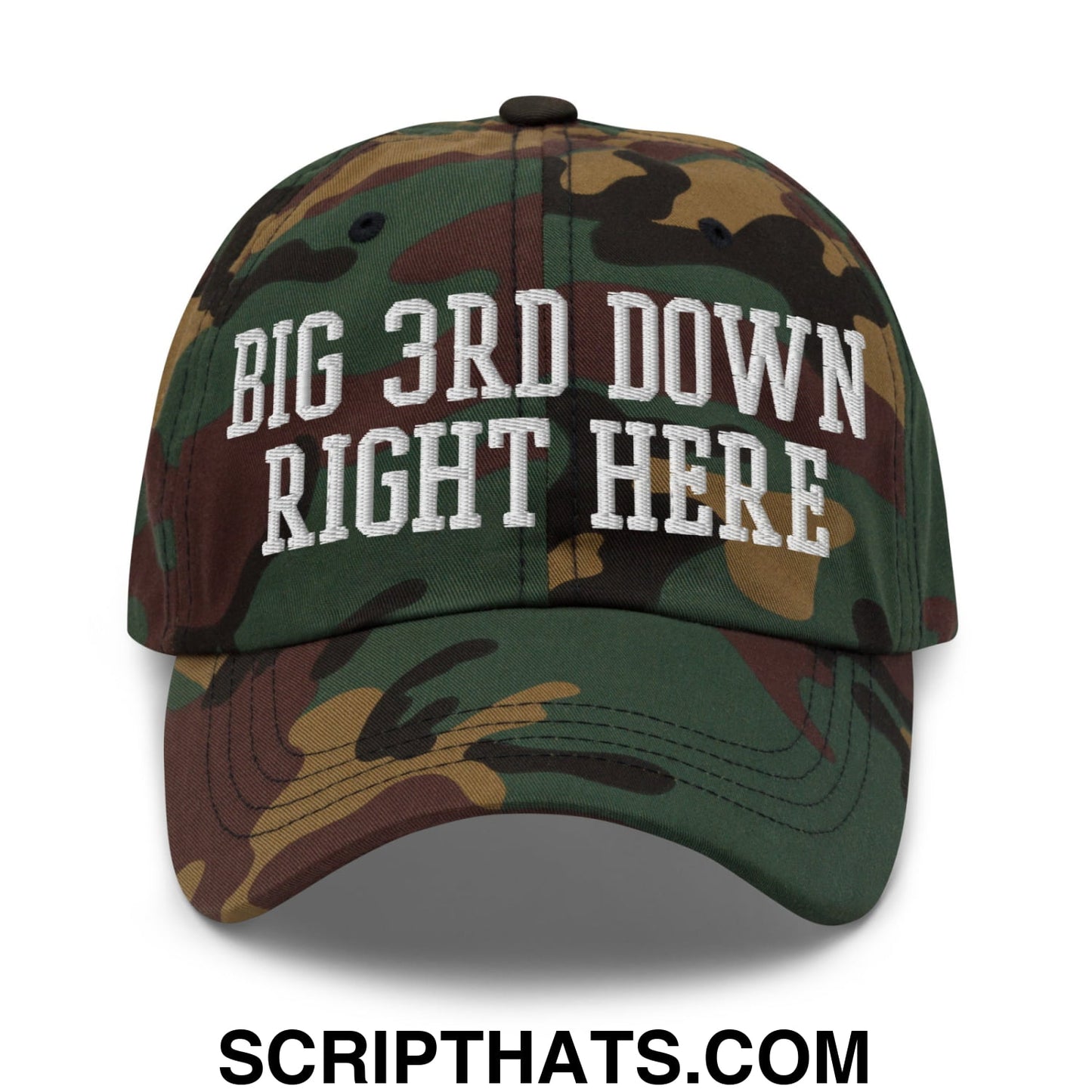 A camouflage unstructured dad hat with white embroidered text big 3rd down right here in an athletic style