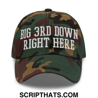 A camouflage unstructured dad hat with white embroidered text big 3rd down right here in an athletic style