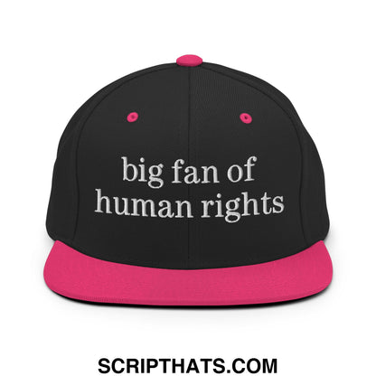 Black snapback cap with pink brim and button featuring white embroidered text big fan of human rights