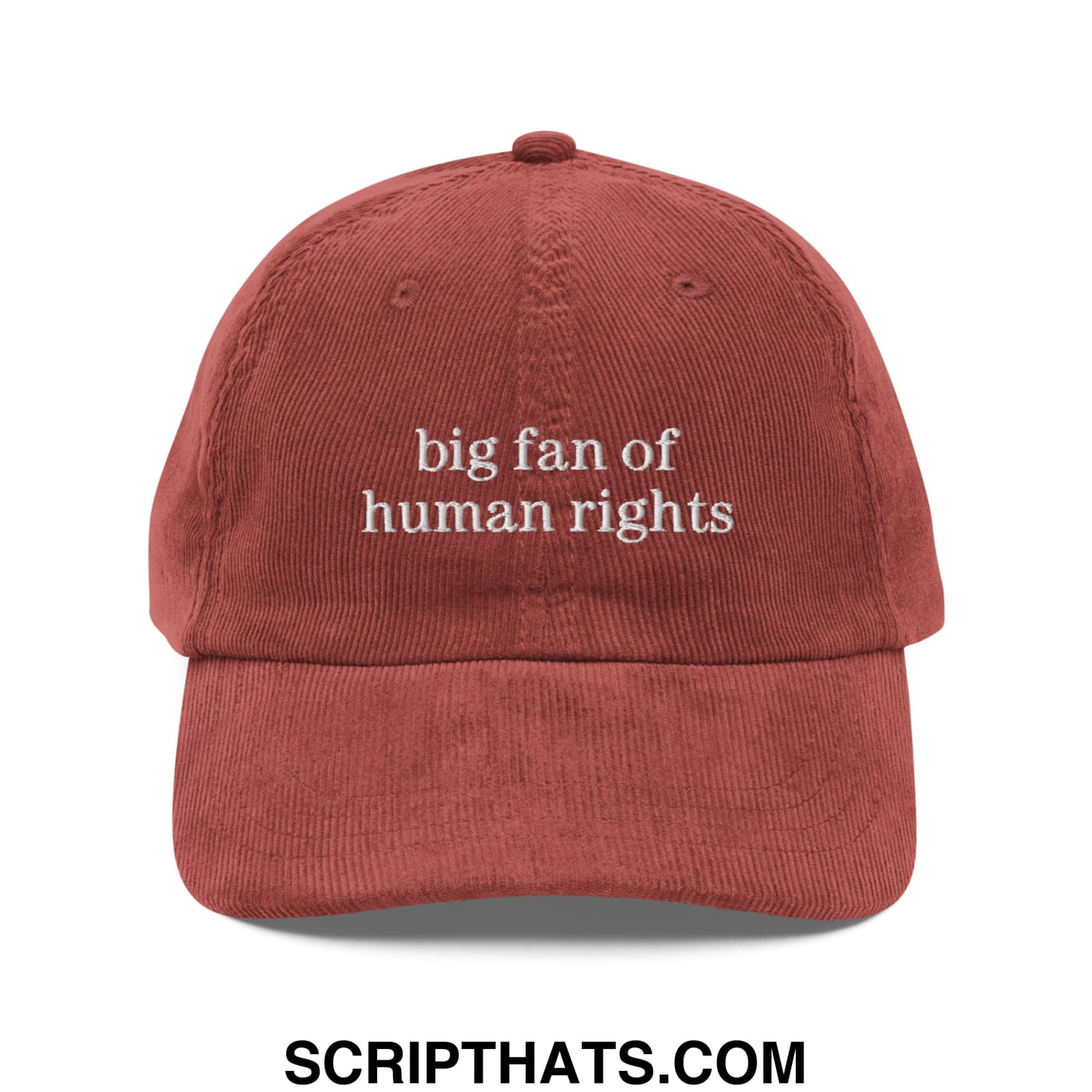 A rust-colored corduroy dad hat with white embroidered text big fan of human rights unstructured design