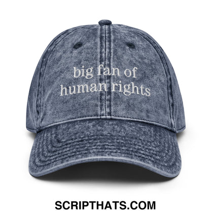 Faded blue denim dad hat with white embroidered big fan of human rights text in an unstructured style